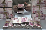 Китайцы готовы повысить уровень юаня